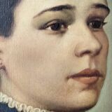 Oil on canvas portrait in an antique gilded wooden frame.