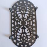 Large vintage black cast iron trivet
