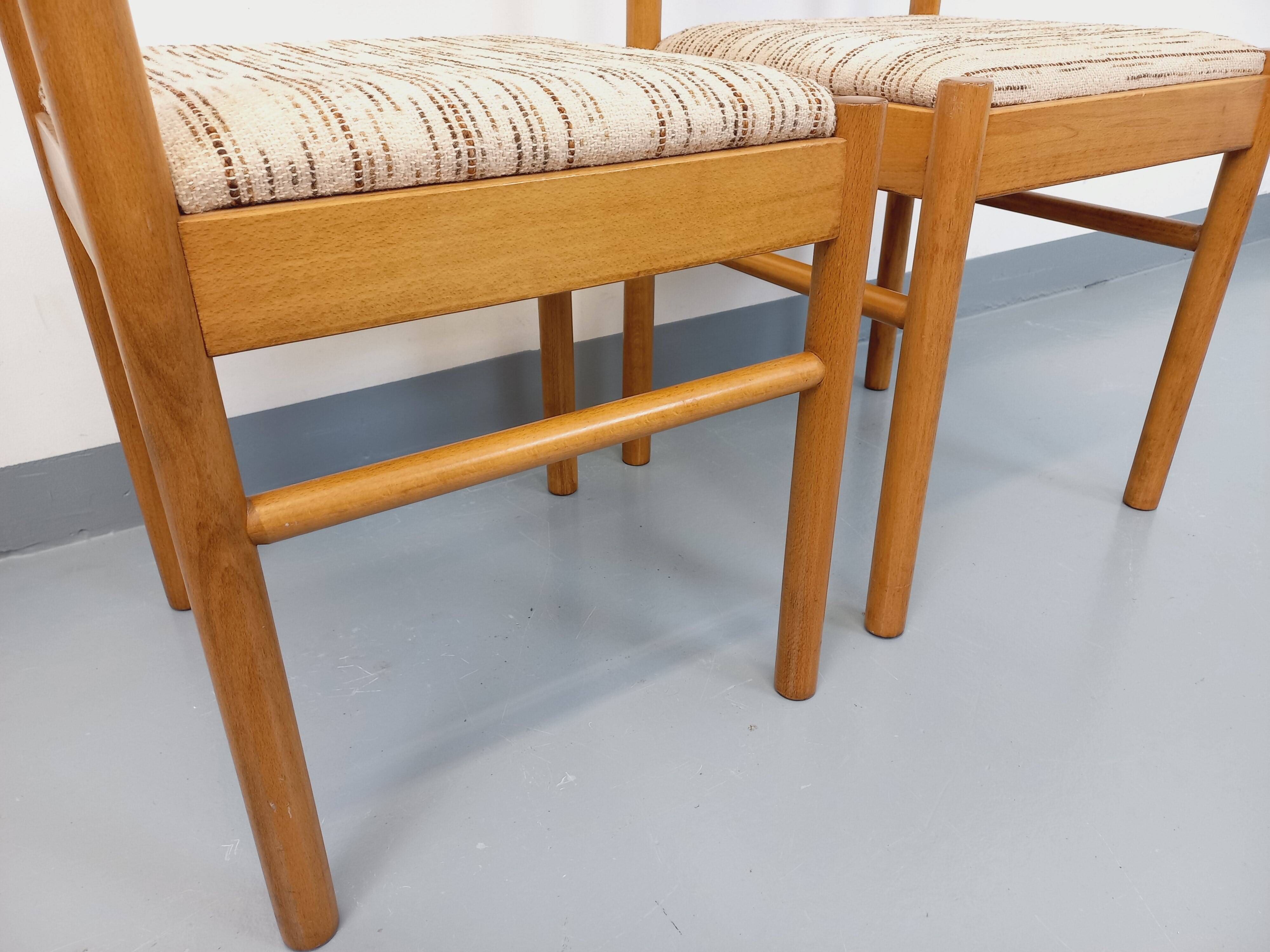 Pair of vintage Baumann chairs in wood and fabric from the 70s