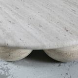 Circular travertine coffee table