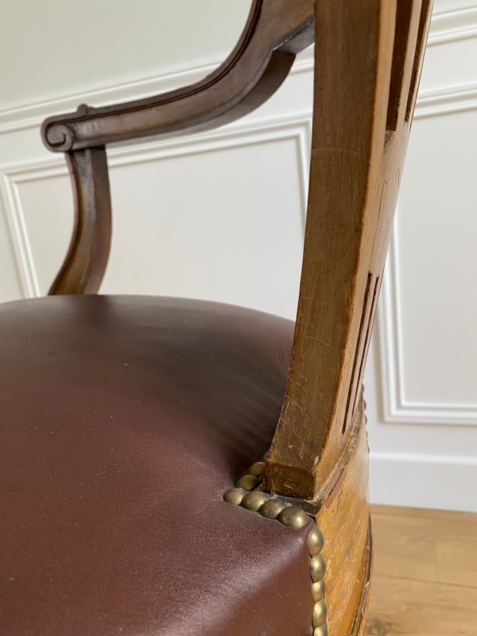 Vintage office chair in wood and brown studded leather late nineteenth