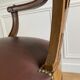 Vintage office chair in wood and brown studded leather late nineteenth