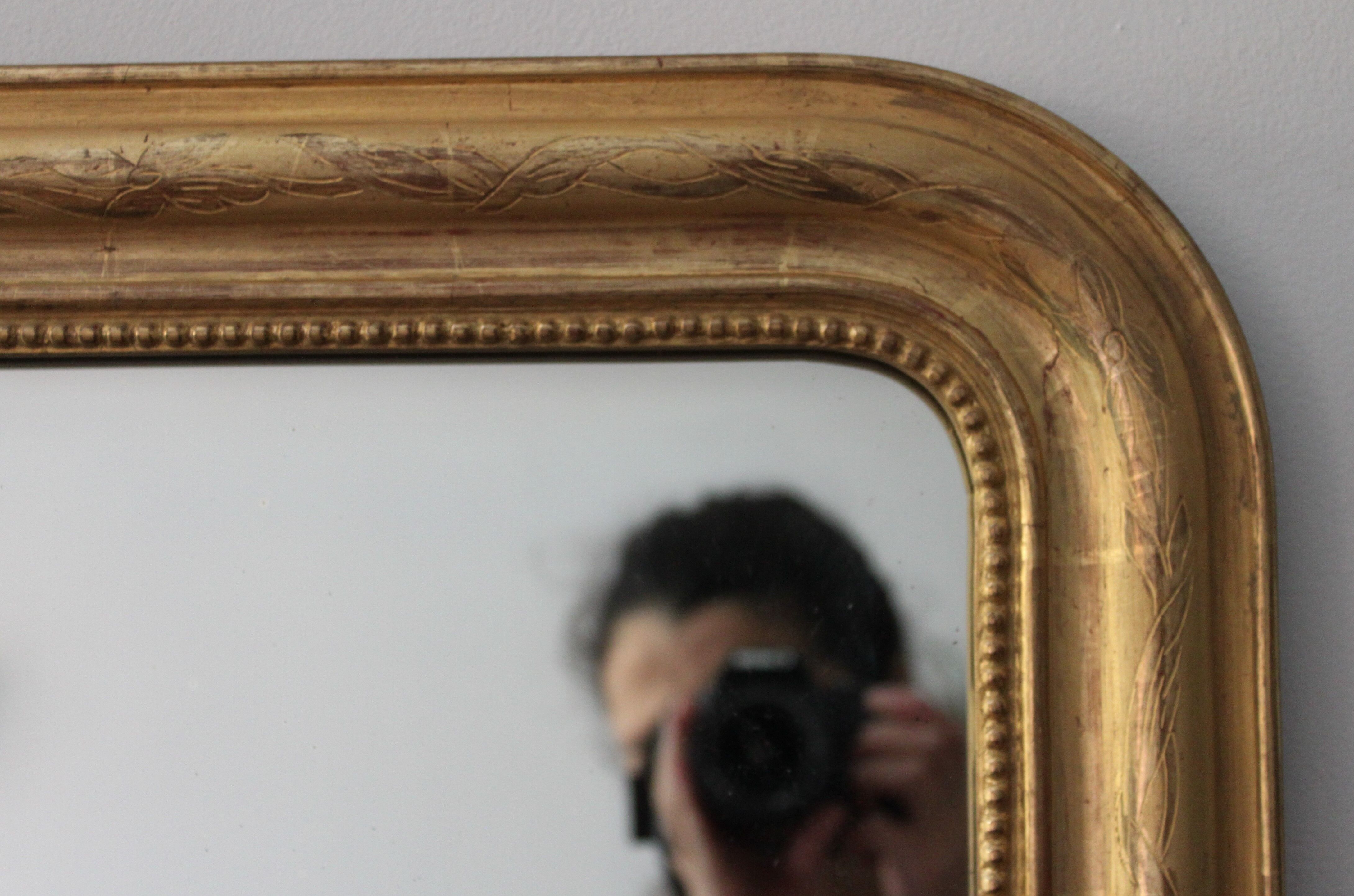 Gilded Louis Philippe mirror dated 1896