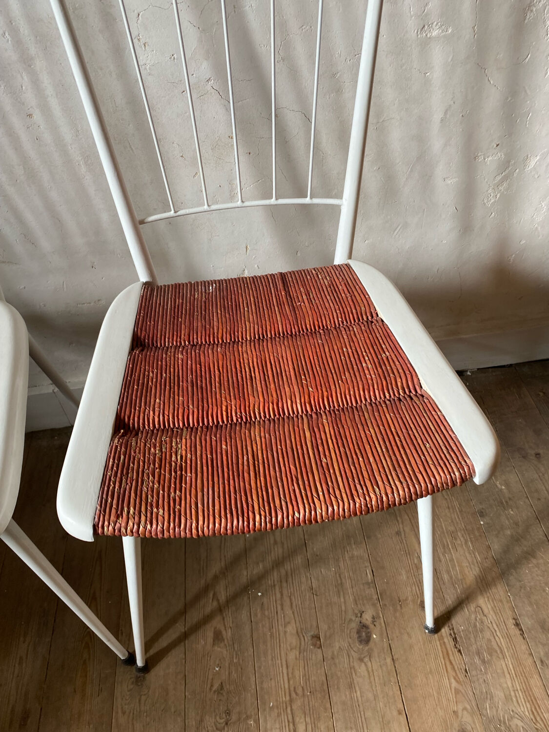 Metal and straw chairs