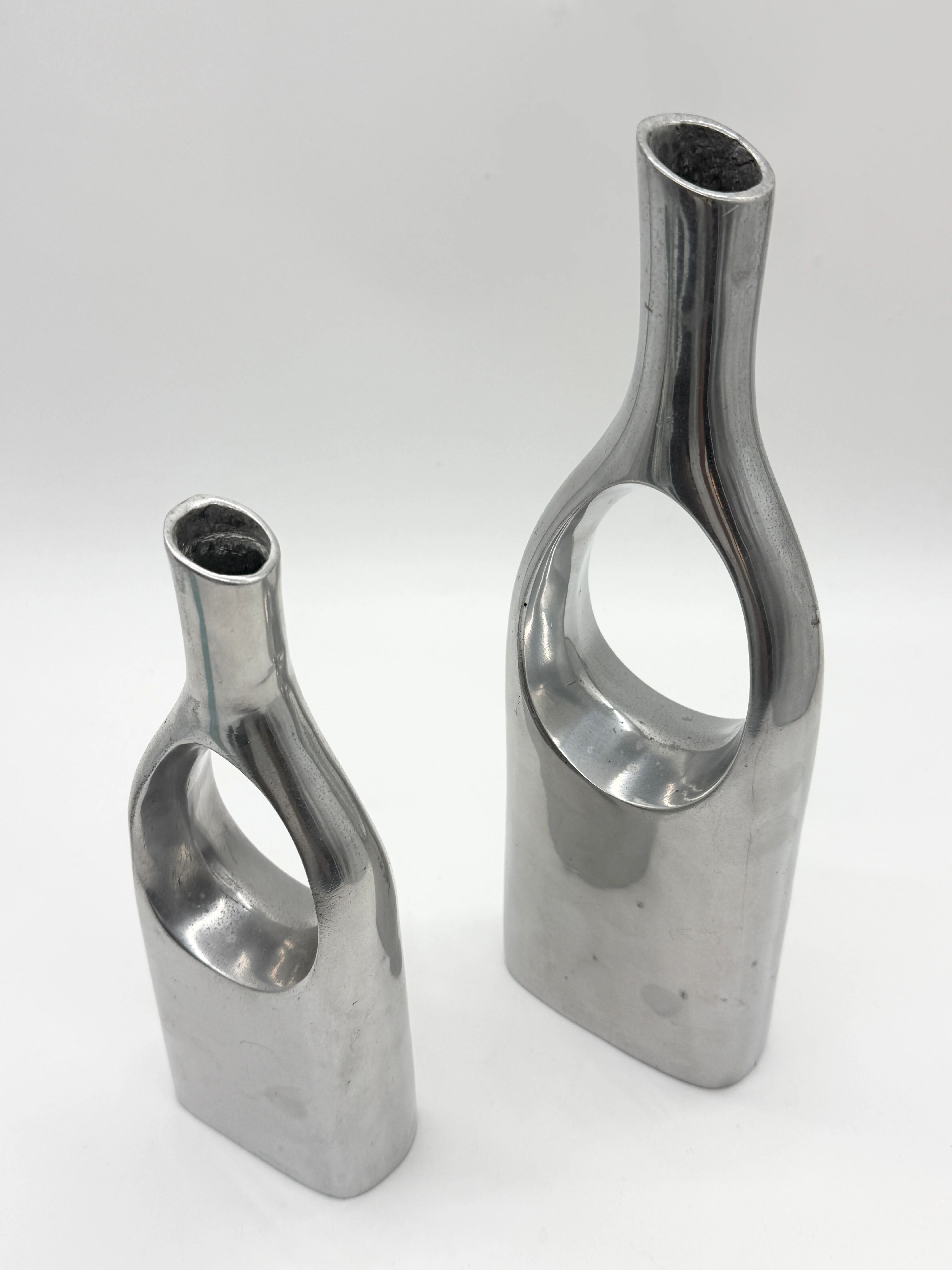 Pair of "drop" vases in aluminium cast, Italy, 1970s