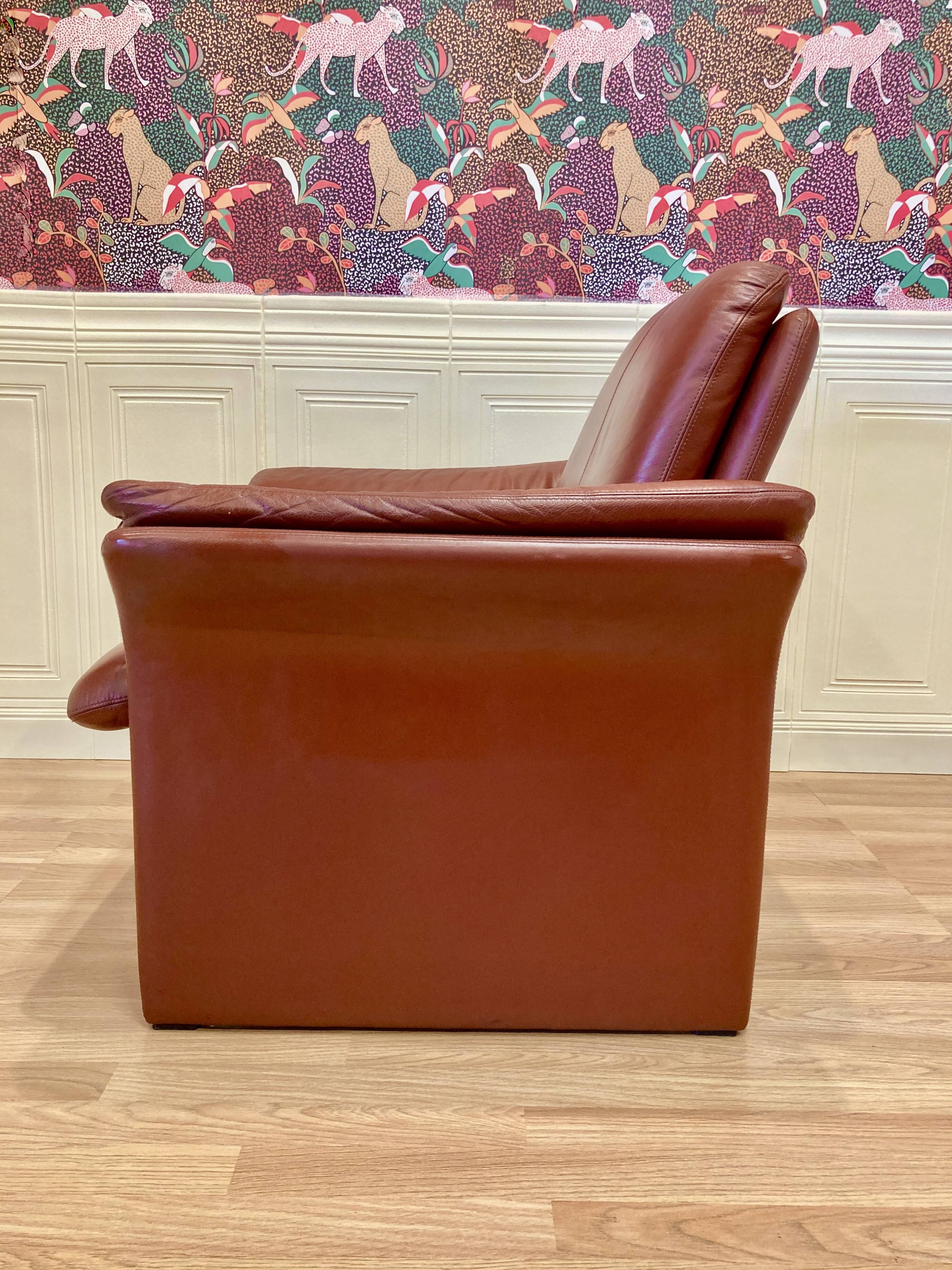 Pair of "Erpo" designer adjustable leather armchairs.