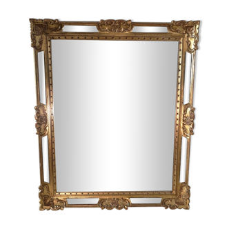 Miroir à pareclose en bois doré et sculpté - 90 x 74cm
