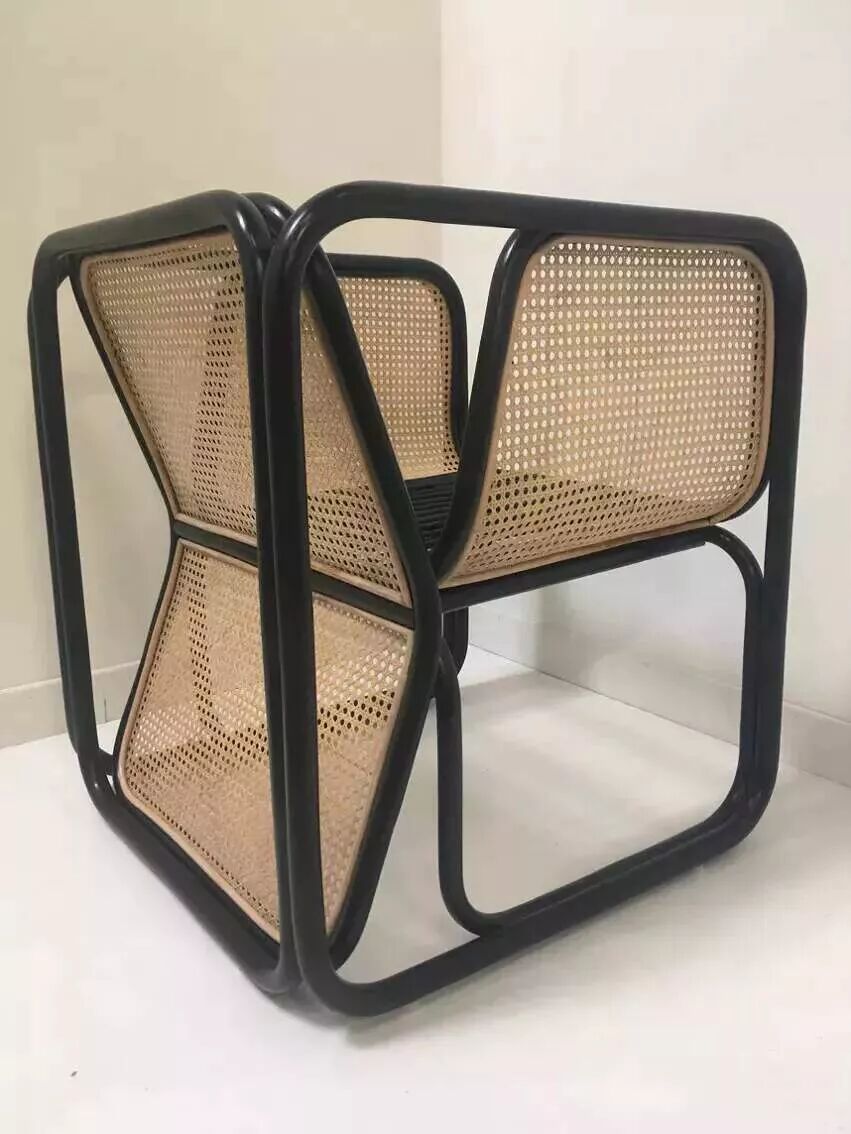 Armchair in black lacquered rattan and natural cane