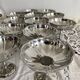 Vintage stainless steel cups on foot