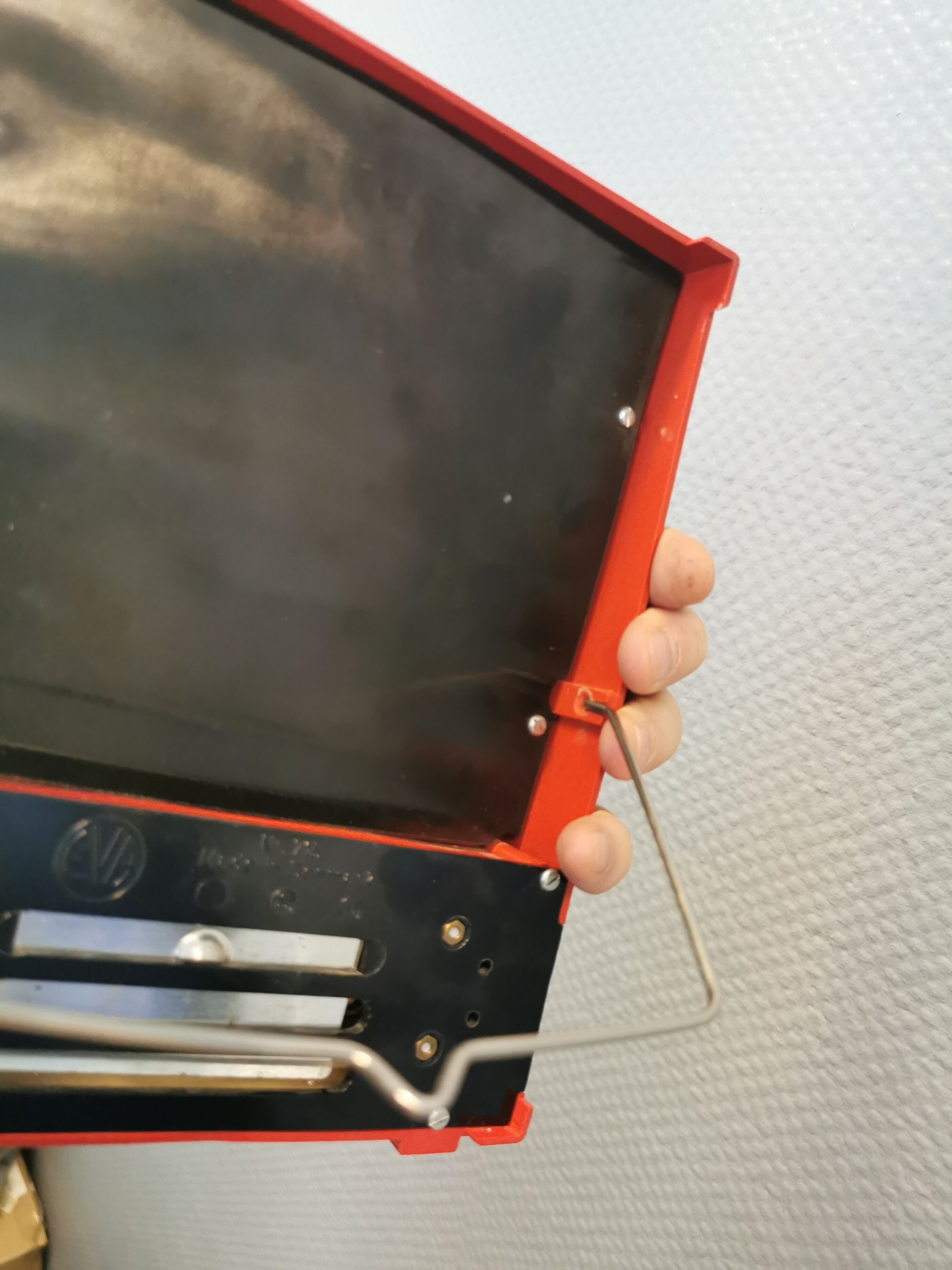 Red danish make up mirror with light and power plug from the 1970