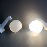 Pair of Art Deco porcelain wall lights with white Opaline globes, 1920