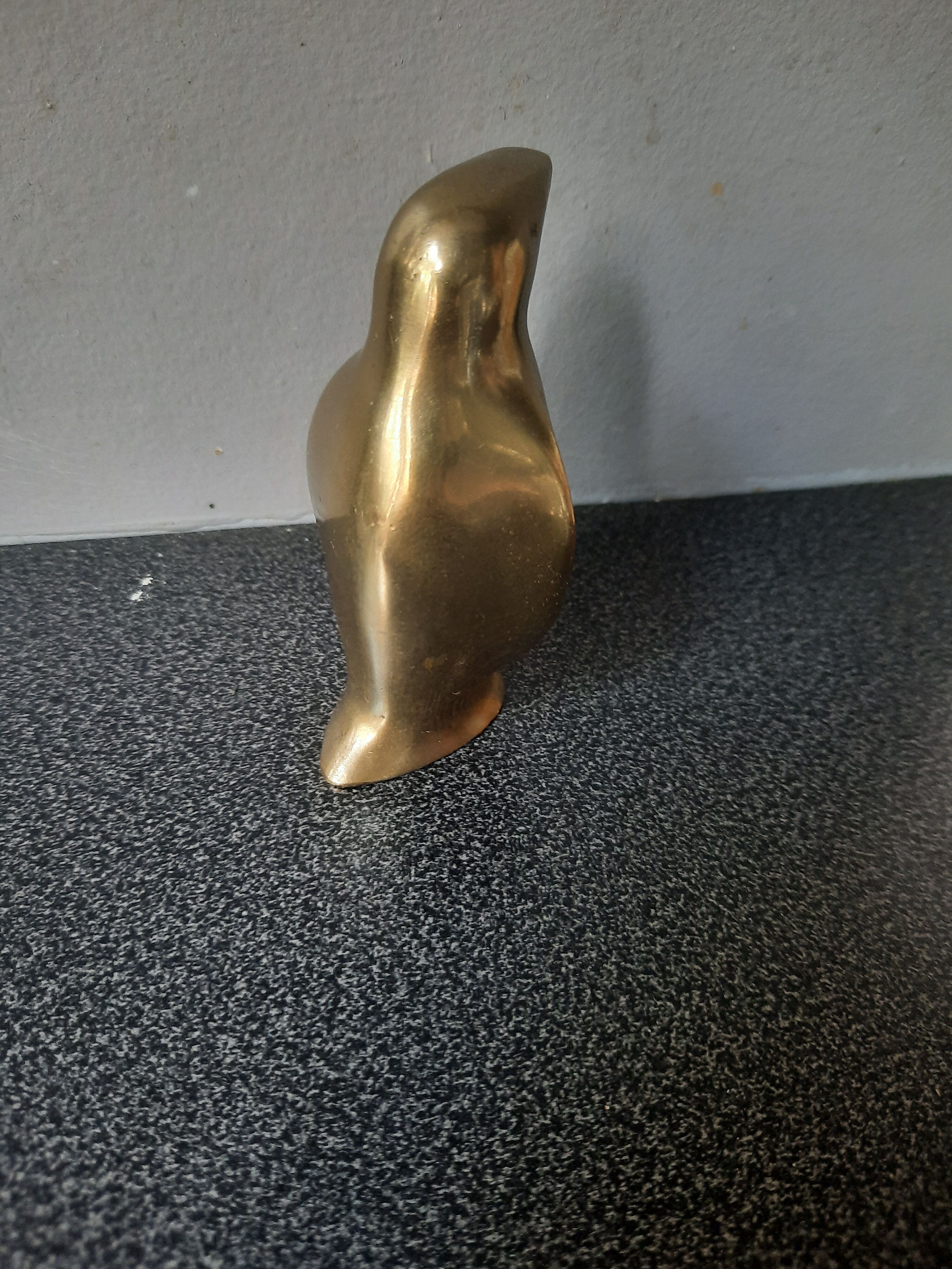 Golden brass penguin
