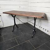 Table de bistrot pieds en fonte dessus en bois massif