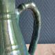 Vintage ceramic pitcher vase in glazed green and blue.