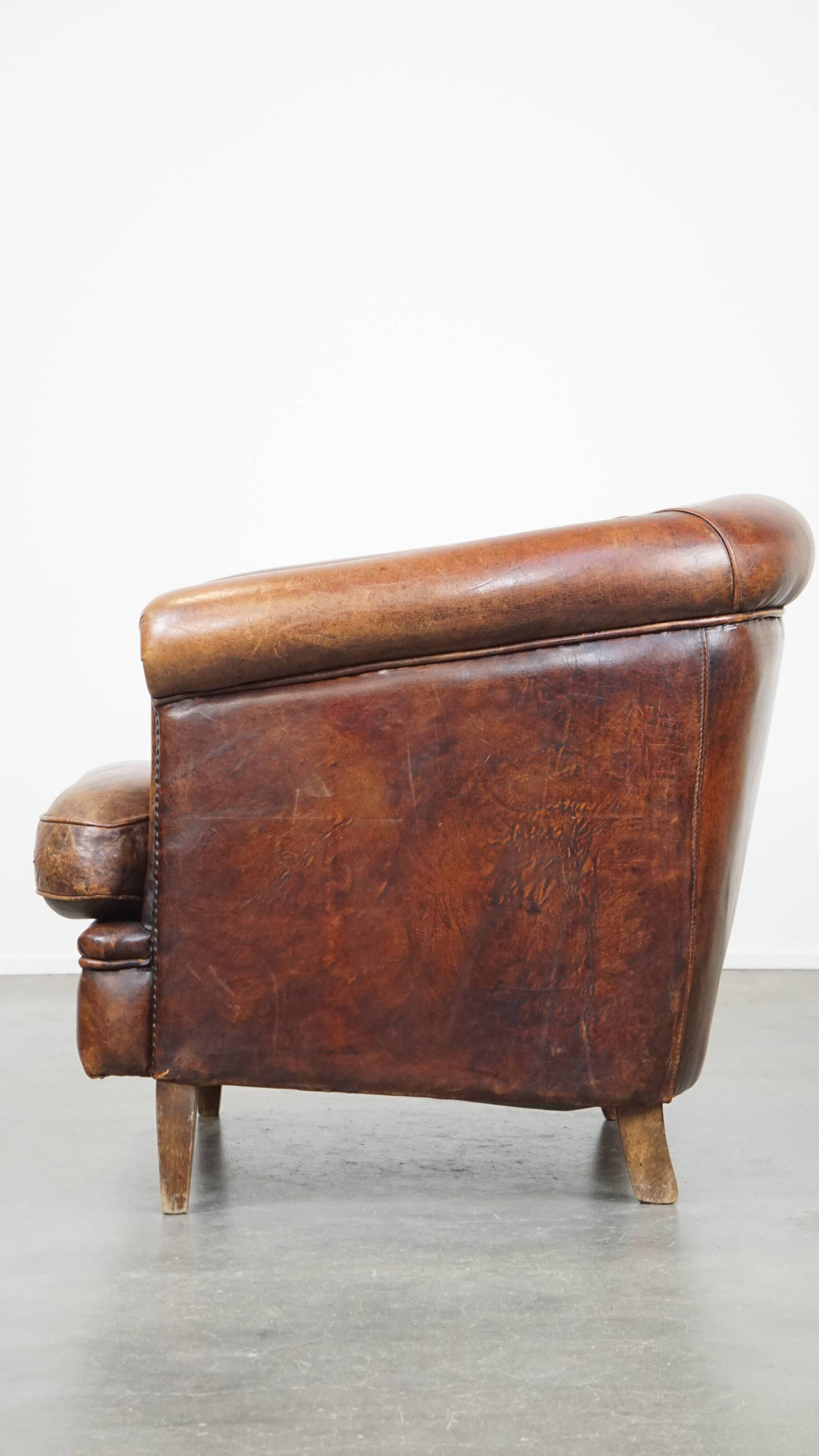Cognac-colored sheepskin leather club chair