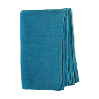 Old hemp harvest tablecloth tinted in caribbean blue