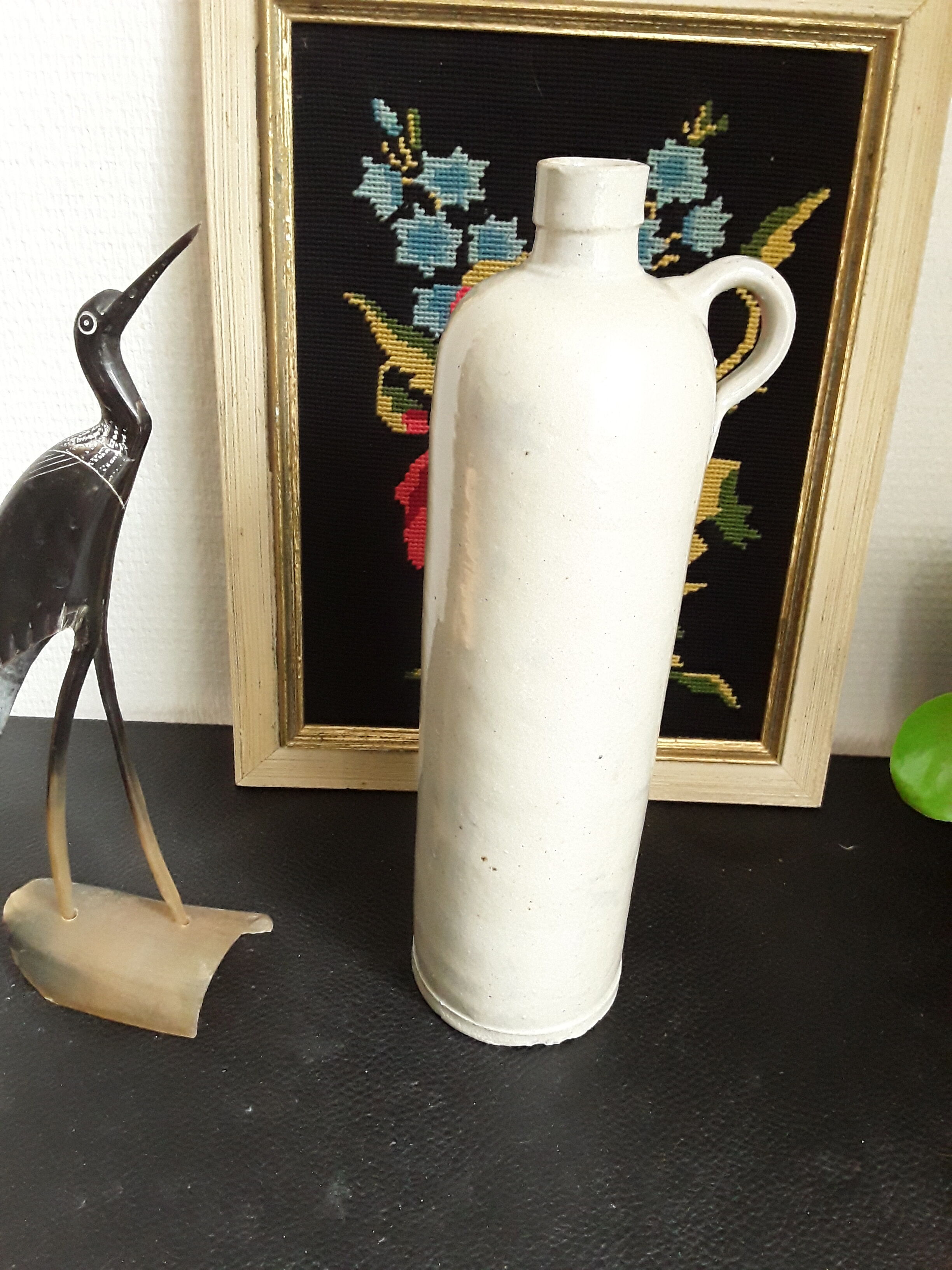 Vintage glazed stoneware bottle with handle