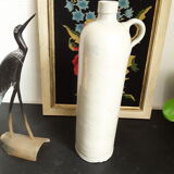 Vintage glazed stoneware bottle with handle