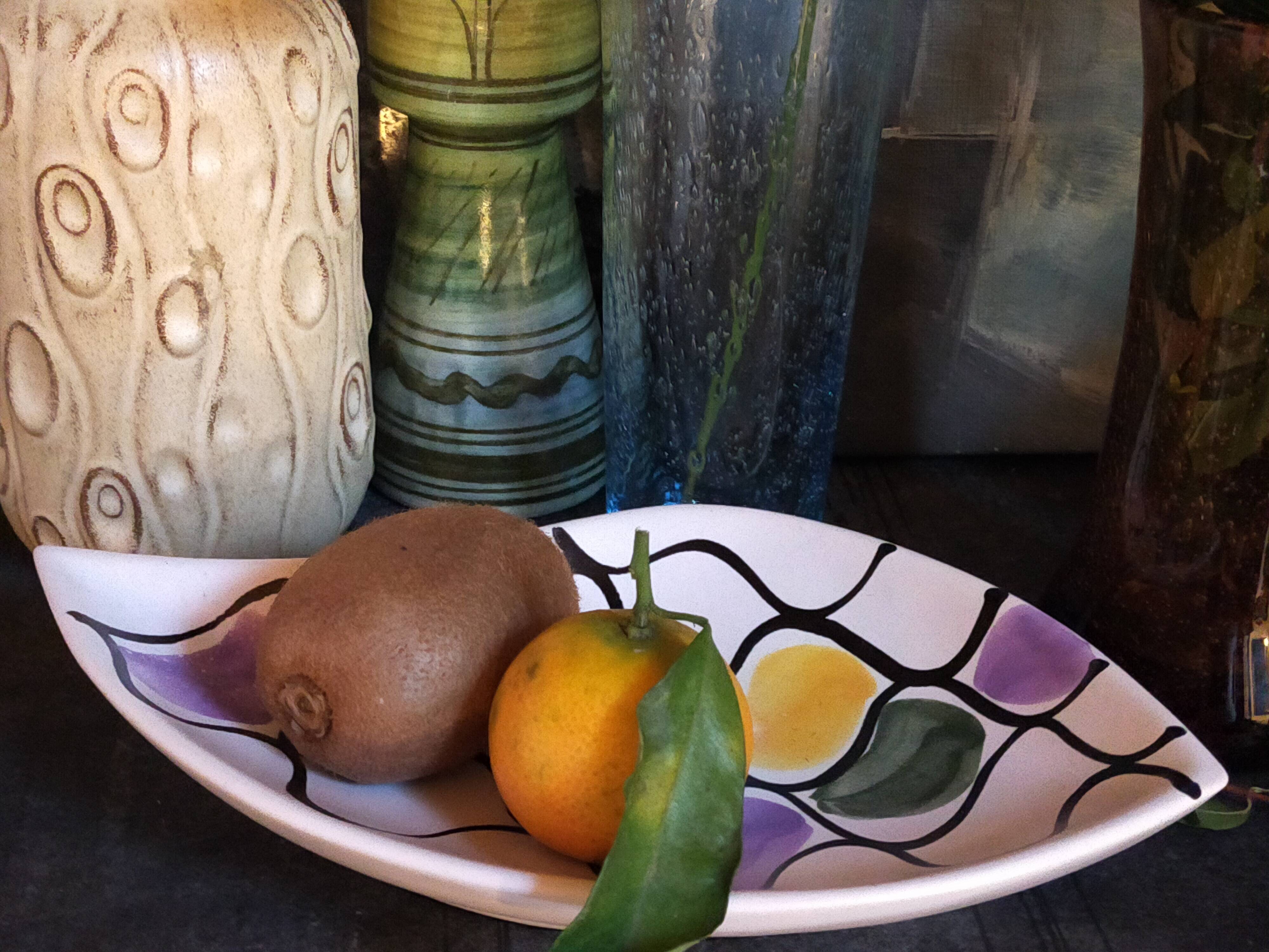 Three vintage free-form ceramic ravine dishes from the 1950s