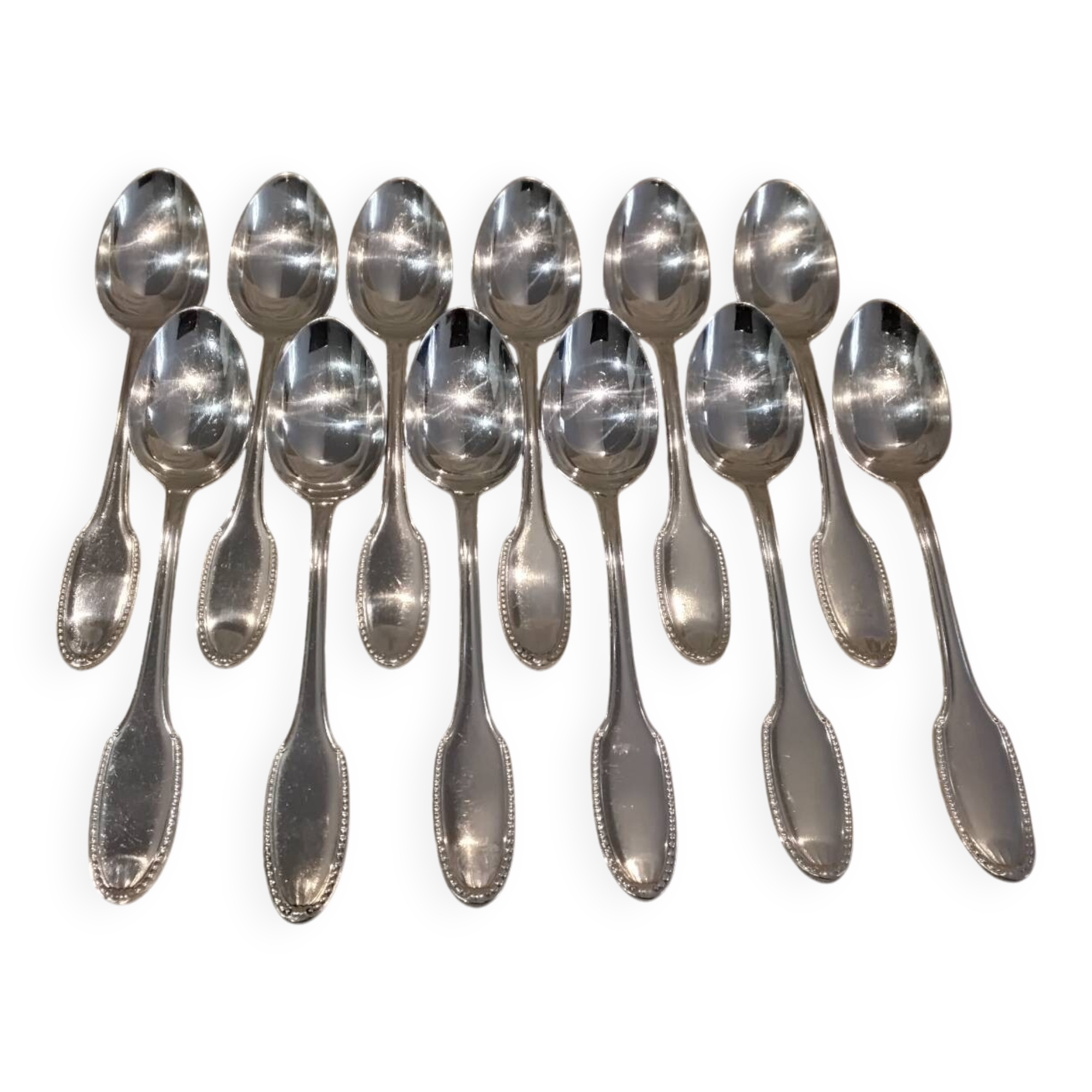 12 silver plated dessert spoons, goldsmith Alfenide, St LXVI pearls