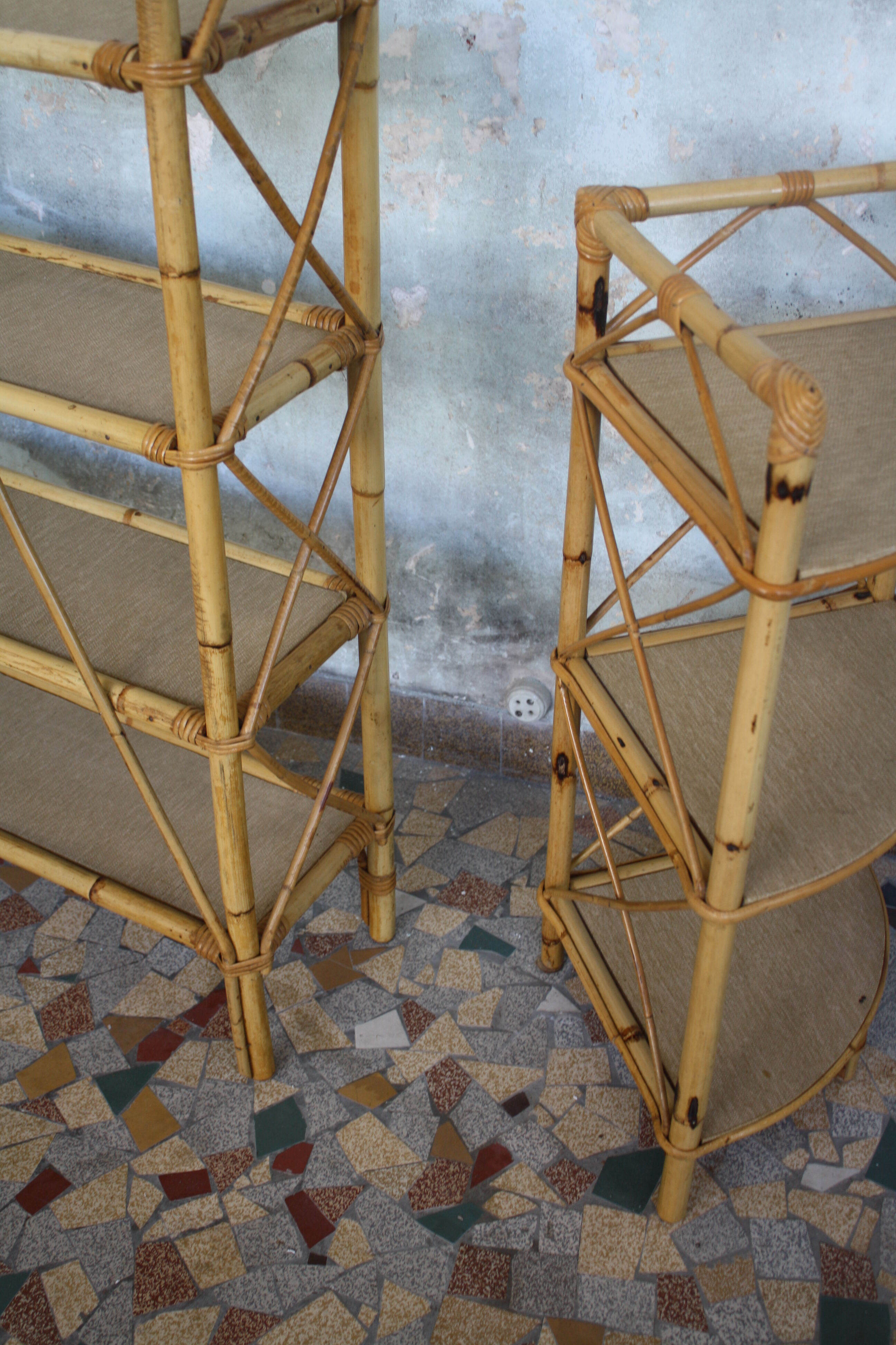 Pair of rattan shelves including a corner shelf