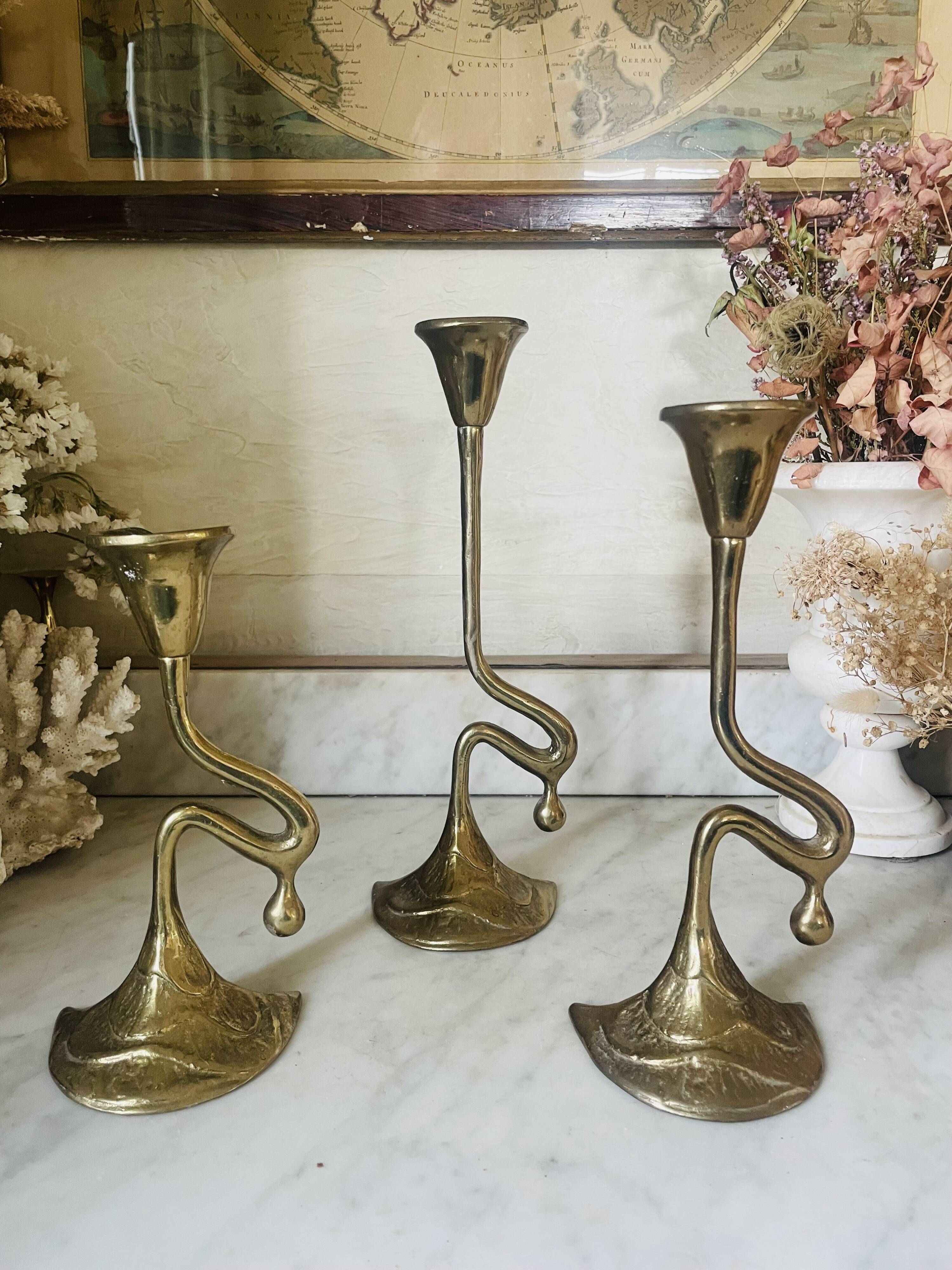 Art Nouveau style brass candlestick trio