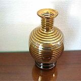 Old vase in blown glass