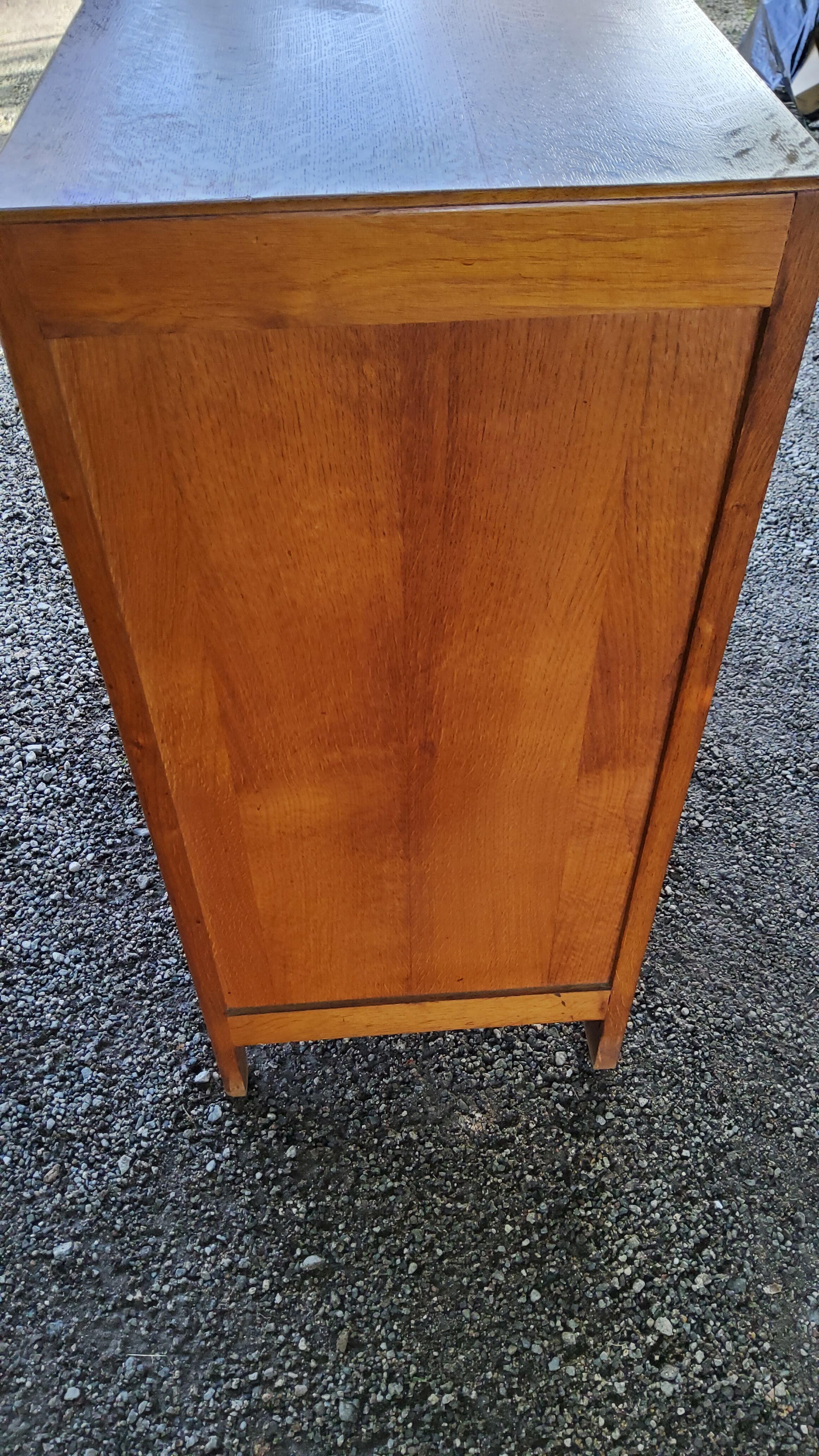 Chest of drawers of the 50s in oak compass feet 4 drawers