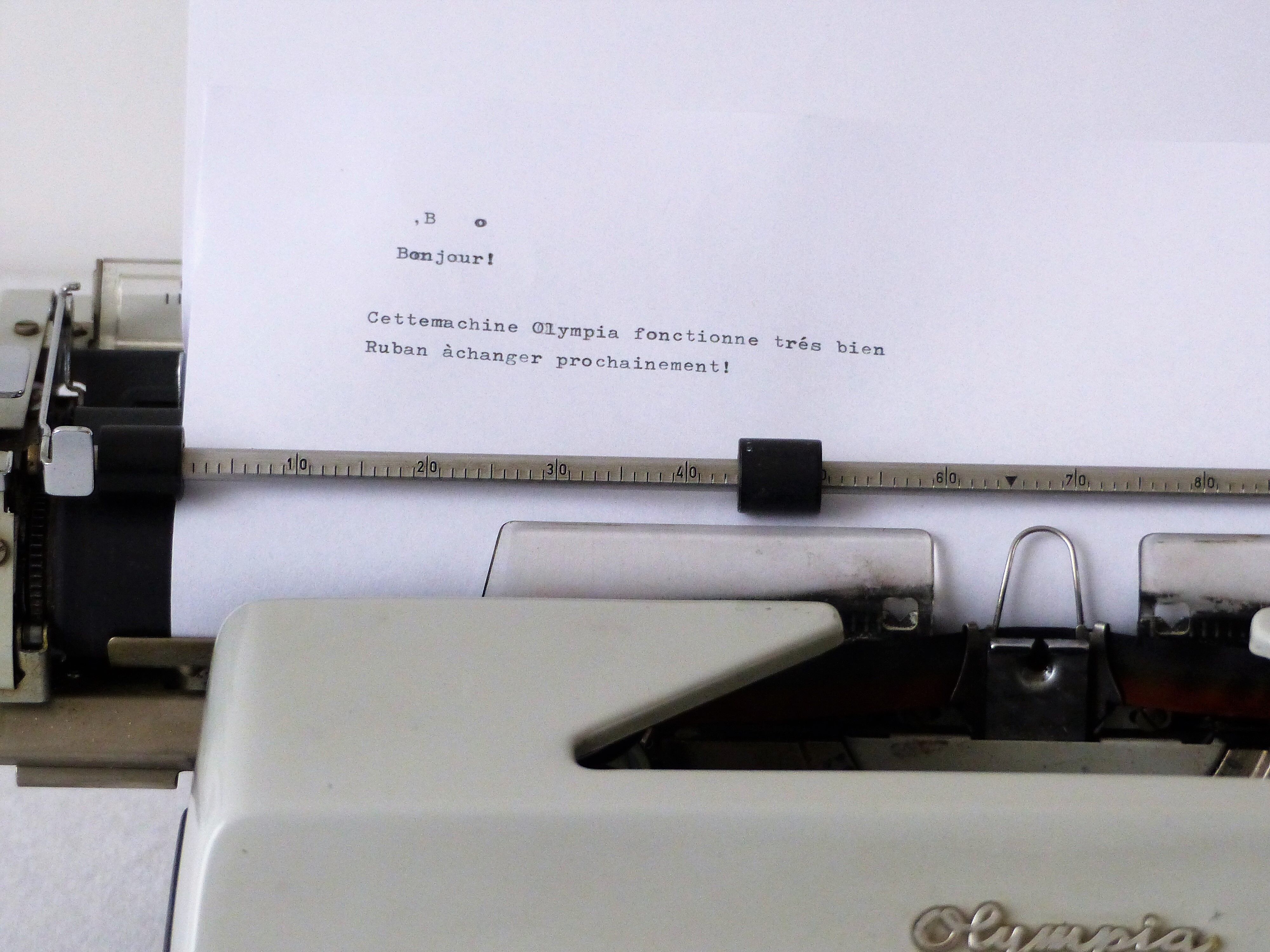 Olympia typewriter in his suitcase