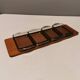 Teak Cabaret tray with four smoke coloured glass bowls, Danish and produced by Wiggers 1970s.