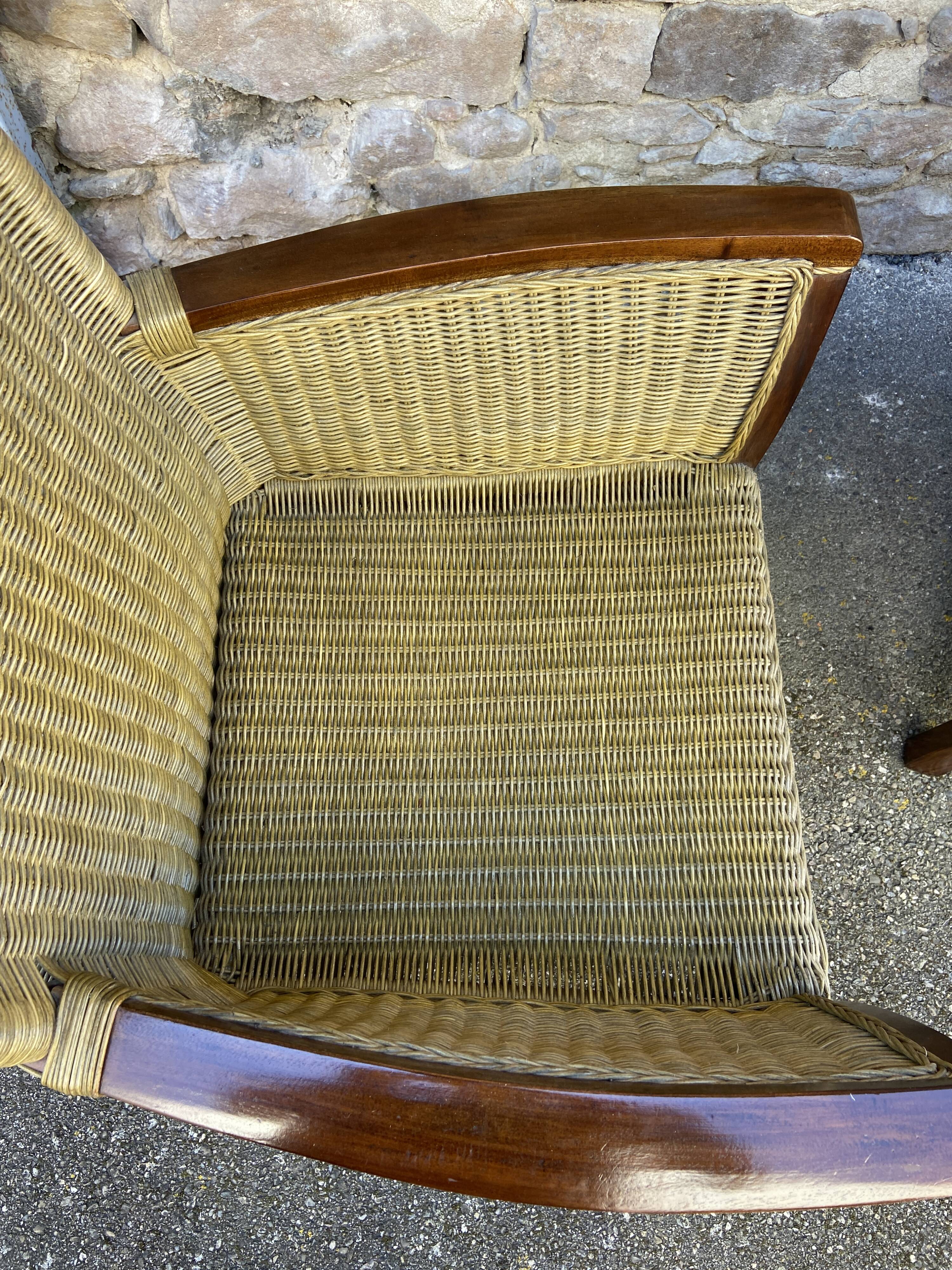 pair of Colonial-style wood and rattan seats