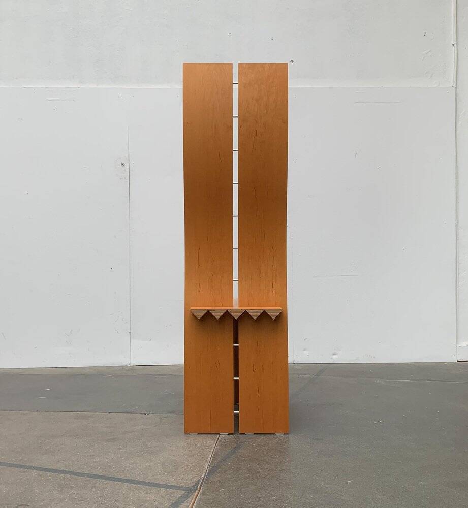 Postmodern chair with a high backrest