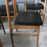 Table with two extensions and its 6 chairs scandinavian teak of the 1970s