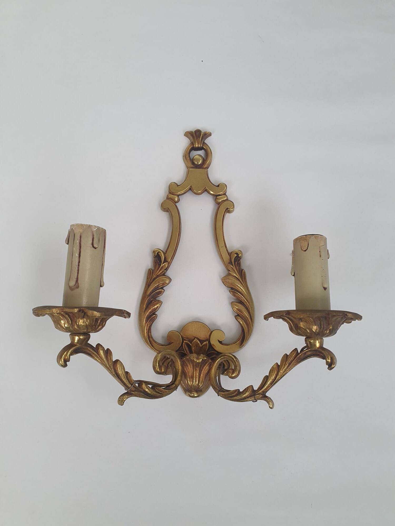 Pair of antique candlestick wall sconces