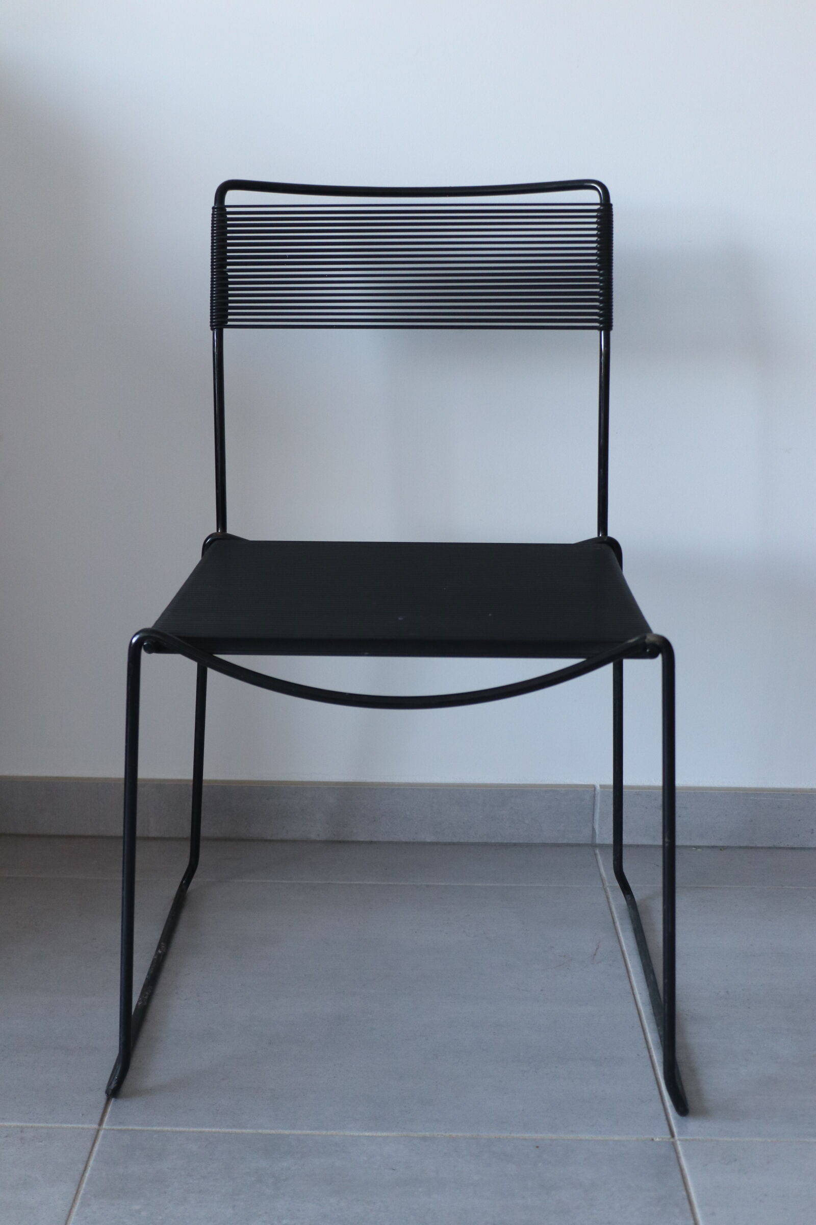 Black chair Spaghetti Giandomenico Belotti for fly line