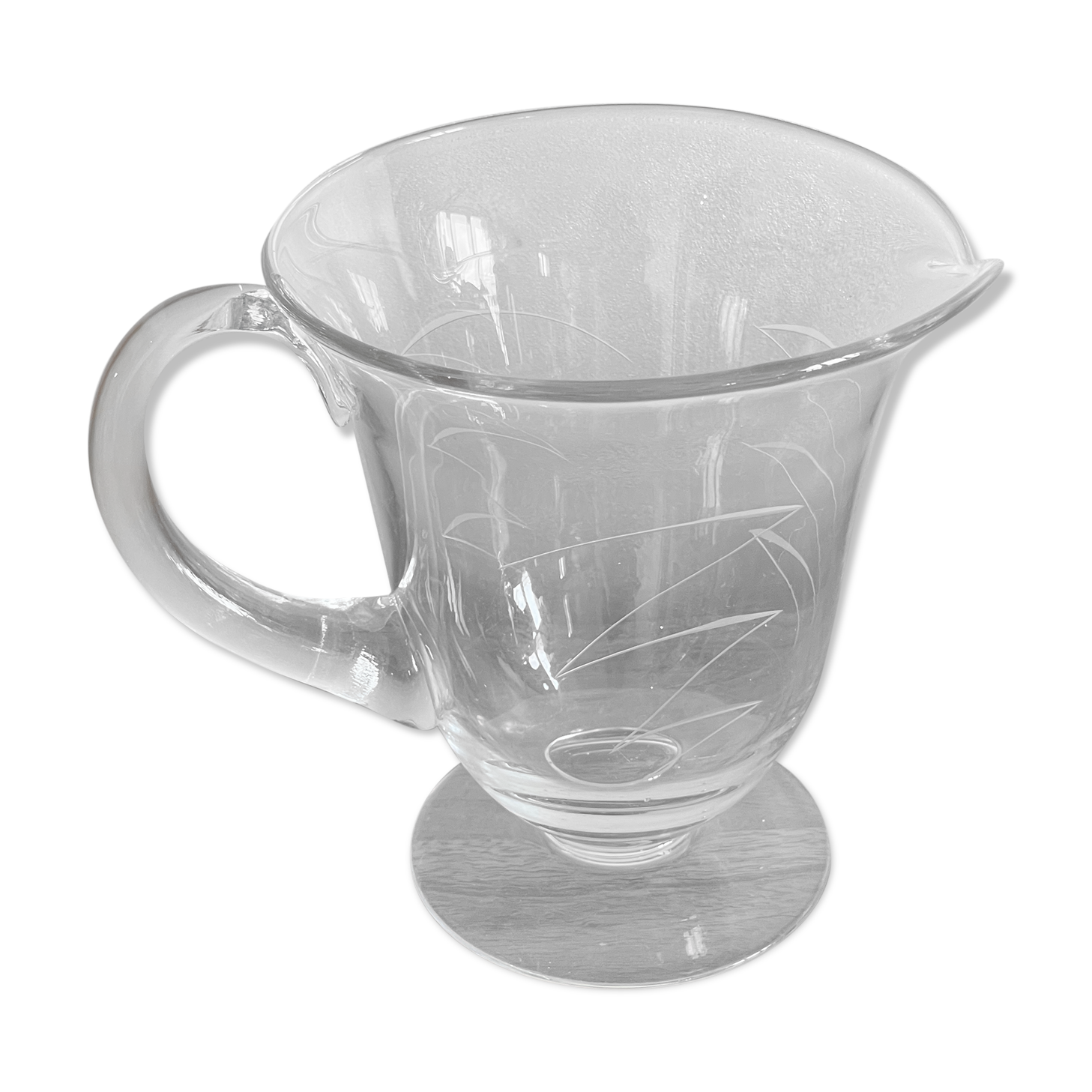 Engraved glass pitcher