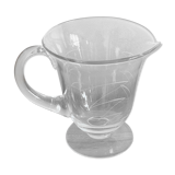 Engraved glass pitcher