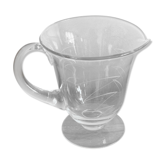 Engraved glass pitcher