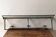 Wall-mounted coat rack in wrought iron, early 20th century.