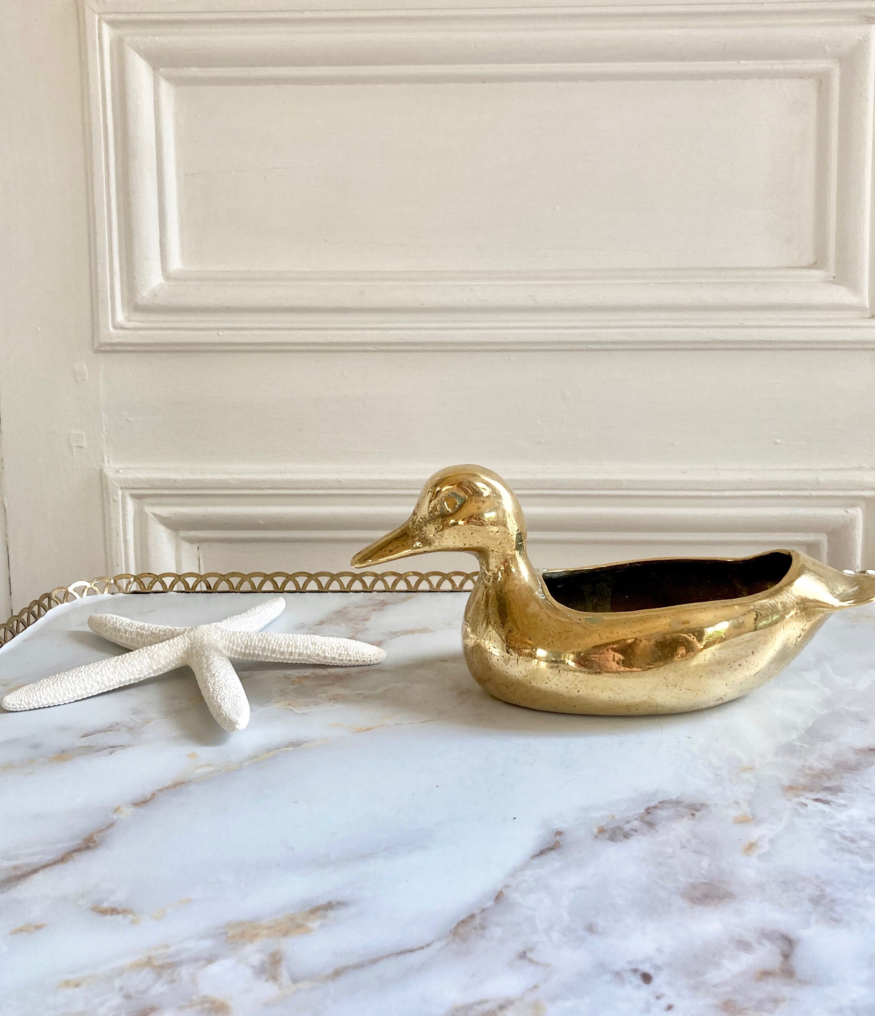 Empty solid brass duck pocket