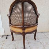 Fauteuil de bureau louis xv, sculpté, canné, garni cuir