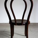 Antique curved wooden children's chair by Fischel, early 20th century.