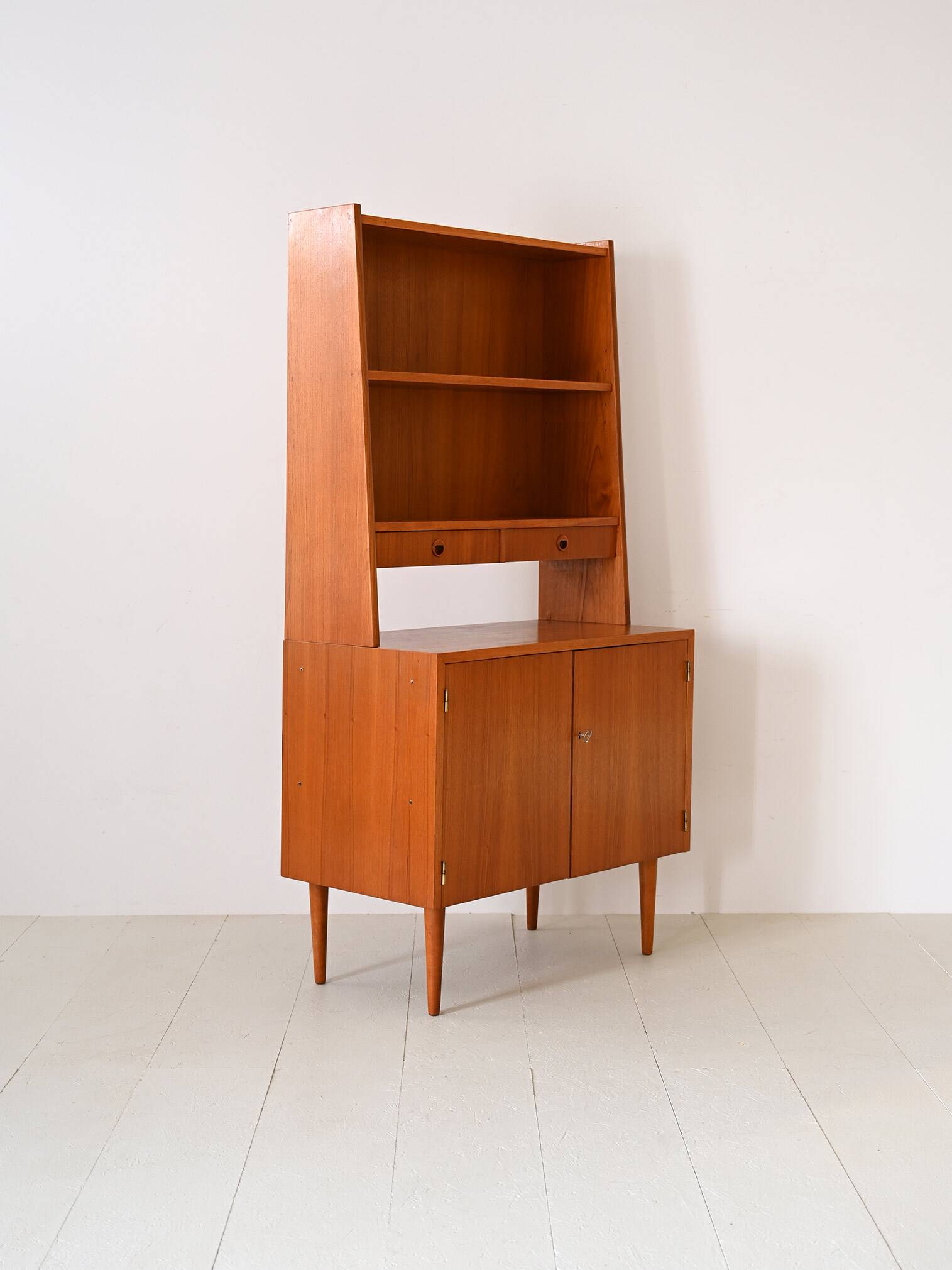 Bookcase with drawers and storage compartment