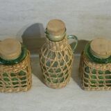 Set of 4 pots and 1 decanter with caps and braiding