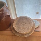 Ancient ceramic salt cellar and its lid.