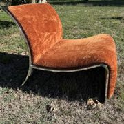 Chrome steel armchair and orange fabric by Vittorio Introini