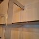 Wall shelves in wood, stainless steel and glass Roche Bobois