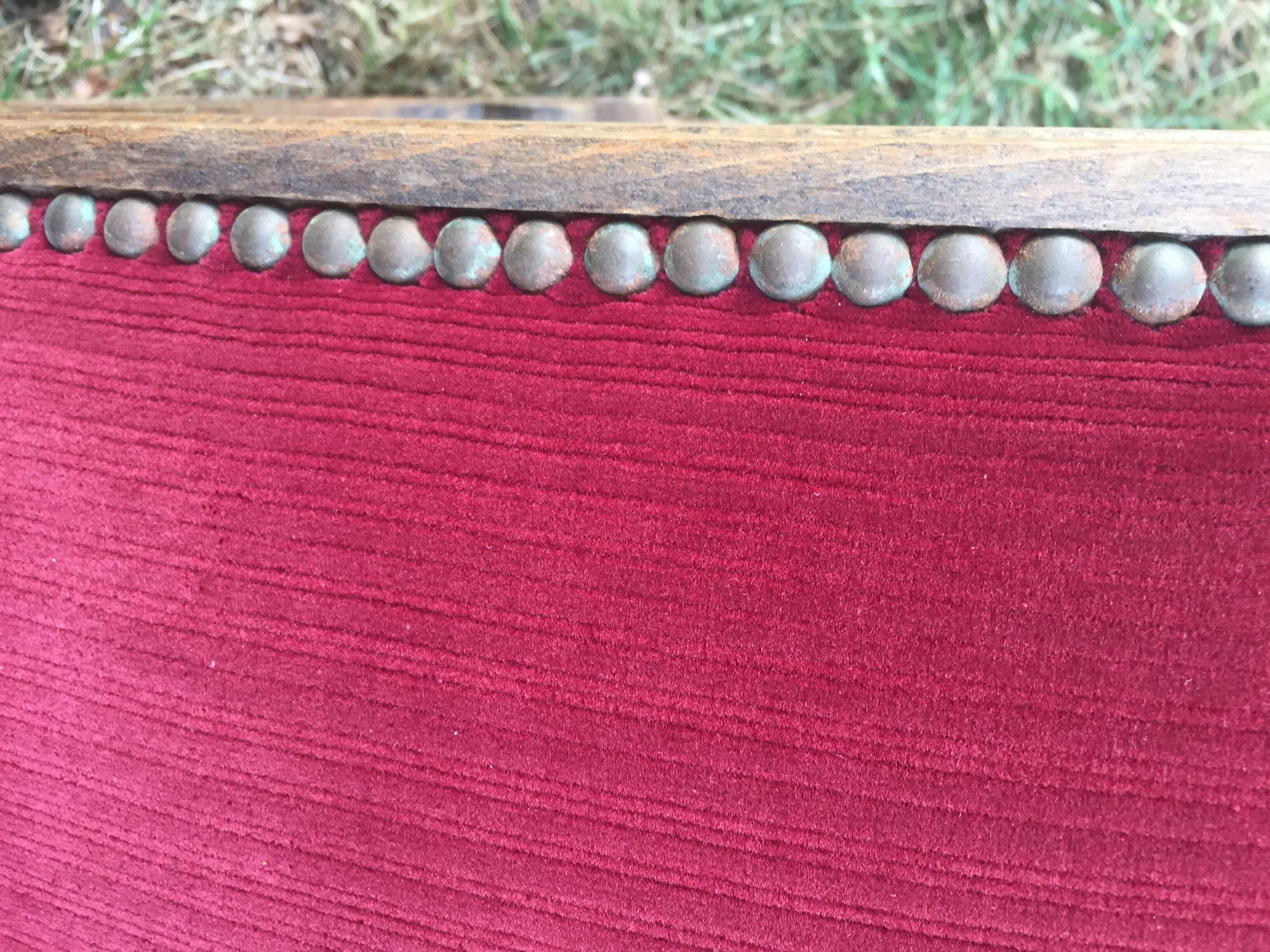 50s footrest in red velvet and scuplented wood
