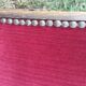 50s footrest in red velvet and scuplented wood