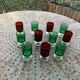 11 verres a vin ou aperitifs, 6 de couleur verte et 5 de couleur rouge vintage 1970